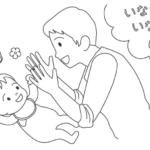 赤ちゃんをあやしているお父さんのぬりえ